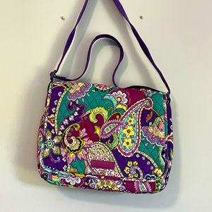 Vera Bradley messenger bag, cross body, and handles. Purple design.